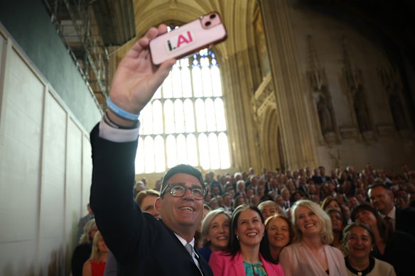 Burnham, the Labour MP for Makerfield, takes a selfie with the party.