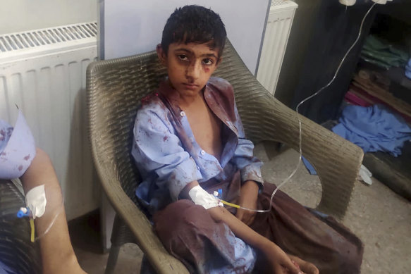 A boy injured in a bomb explosion receives treatment at a hospital, in Mastung near Quetta.