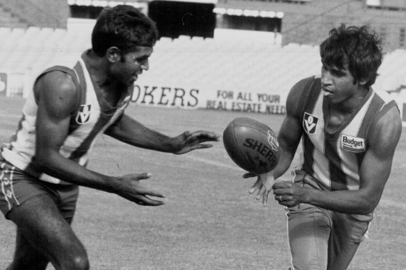 Jim and Phil Krakouer were stars for North Melbourne. Phil is the lead plaintiff in a class action against the AFL for damages due to the racism they endured during their careers.