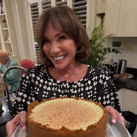 Ann Peacock at a recent party, with Alan Jones in the corner.