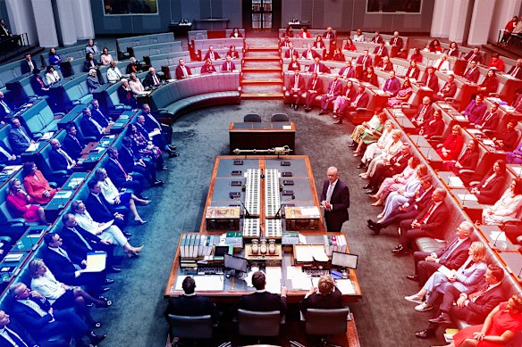 Labor MPs (red) in the House of Representatives now stretch across the aisle, while the Coalition (blue) are a hugely reduced opposition.