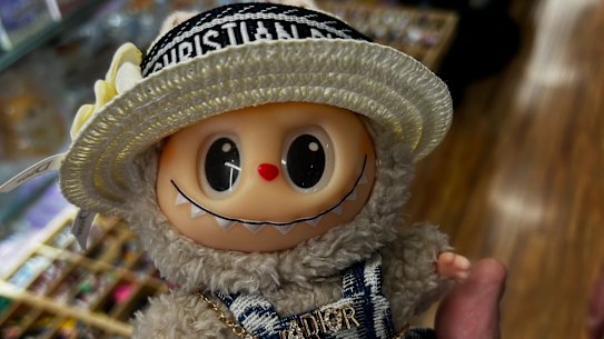 A real Labubu modelling a ‘Dior’ ensemble.