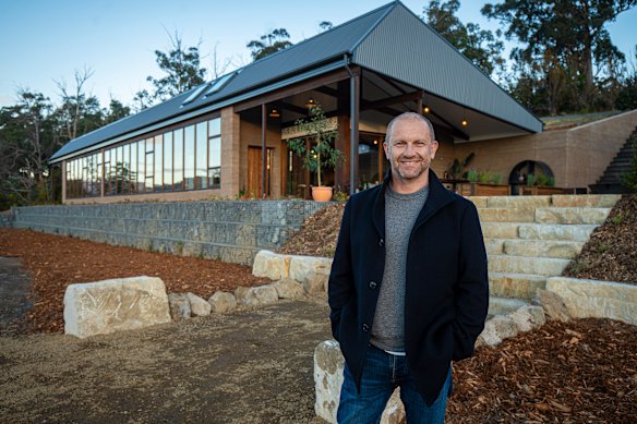 Grand Designs Australia host outside the ‘earthship’ house in Tasmania featured in episode one. 