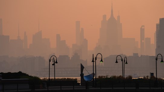 The New York City skyline seen through smoke haze from wildfires in Jersey City on Friday July 17.