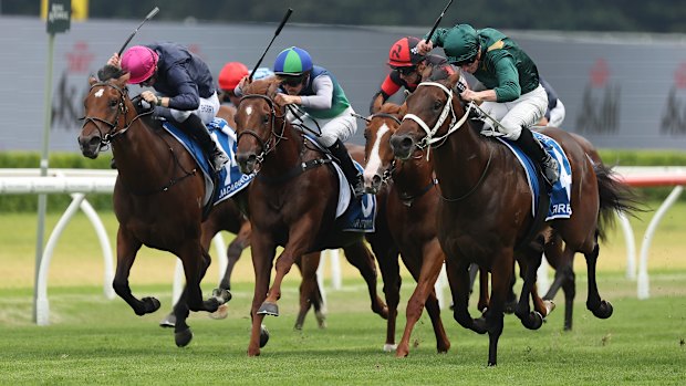 Fireball, right, surges to victory in the Inglis Millennium under James McDonald.