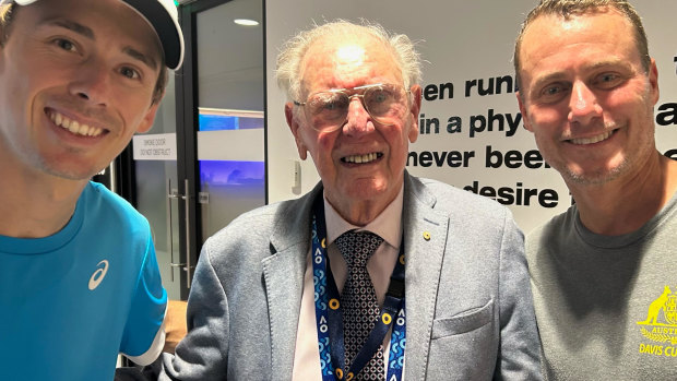 Alex de Minaur (left) and Lleyton Hewitt flank tennis legend Frank Sedgman at the Australian Open on Tuesday.