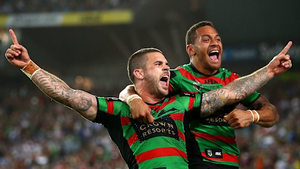 Api Koroisau and Adam Reynolds celebrate South Sydney’s 2014 grand final win against the Bulldogs.