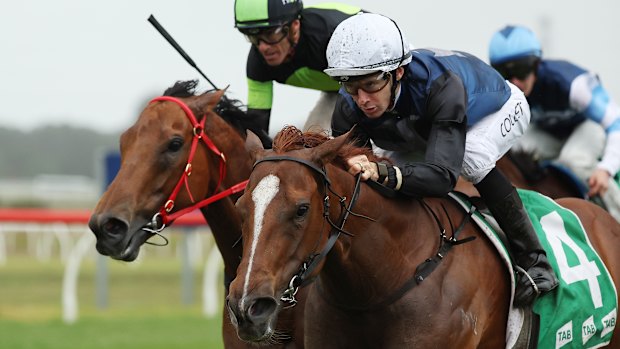 Jason Collett rides Catch The Glory to victory.