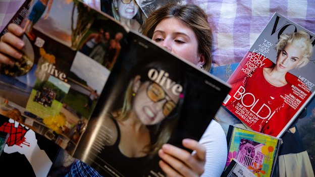 Olive reading her magazine, Olive.