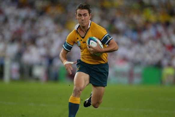 Mat Rogers in full for flight for the Wallabies in 2003.