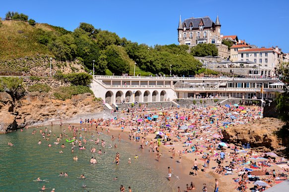 Summer crowds at Plage du Port Vieux in Biarritz.