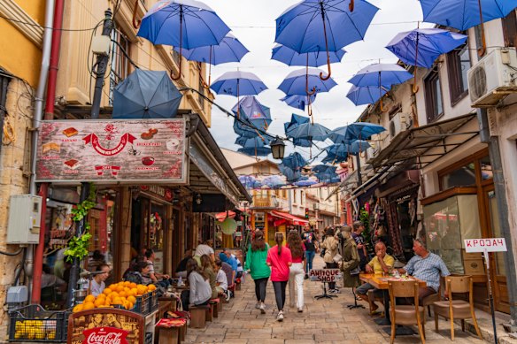 Switch focus to less-visited towns like Skopje in North Macedonia.