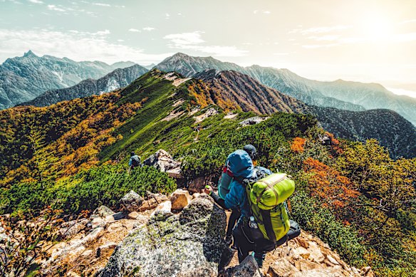 Hikers on a ridgetop.