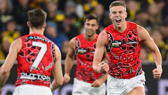 Nate Caddy can just focus on his football amid the turmoil at Essendon as he is locked in until 2028.
