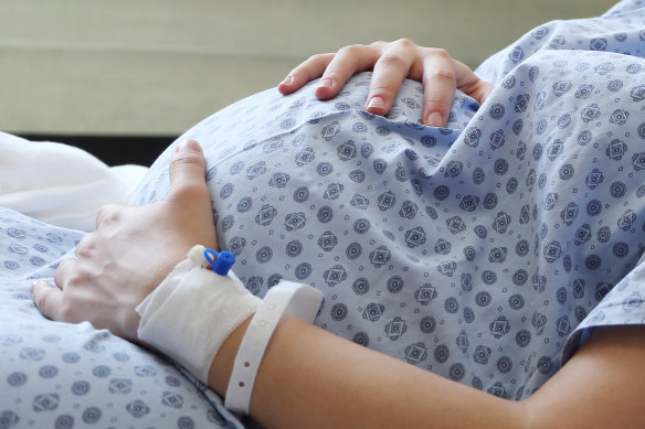 Grace was four months pregnant when she had her first emergency surgery, with 15 more to follow in the coming years. 
