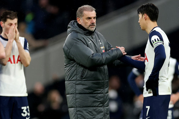 Ange Postecoglou with Son Heung-Min after the loss.