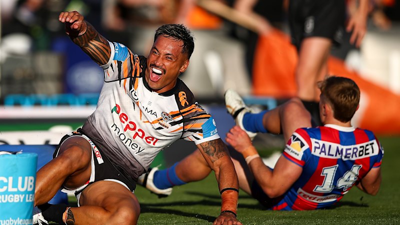 Wests Tigers jump to equal first after Knights mauling