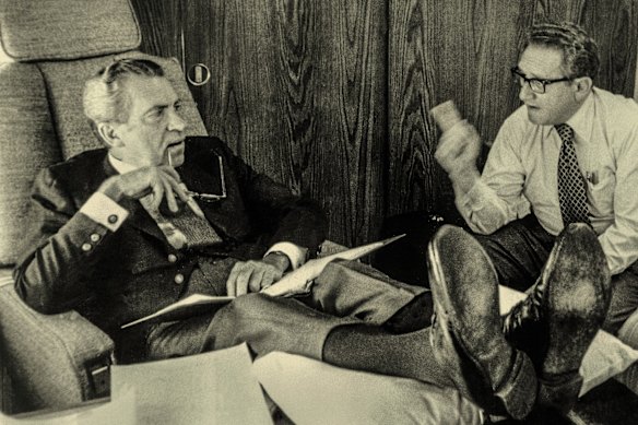 Henry Kissinger aboard Air Force One in 1973 with President Richard Nixon, the year he was awarded the Nobel Peace Prize - when his counterpart Le Duc Tho refused it.