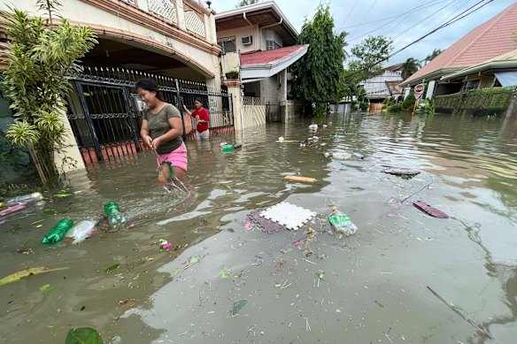 Parts of Cebu City lie submerged below floodwater from Typhoon Kalmaegi.