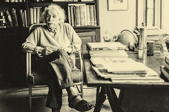 Physicist Albert Einstein, pictured in his study at Harvard University in 1951.