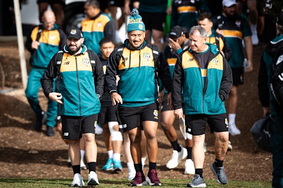 Ian Foster (right) walks to training with AUNZ and Wallabies hooker Brandon Paenga-Amosa and assistant coach Zane Hilton.
