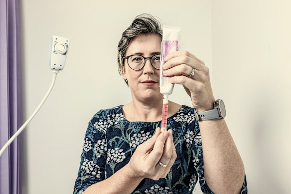 Women’s health GP Karina Severin with a tube of the female testosterone cream AndroFeme. 