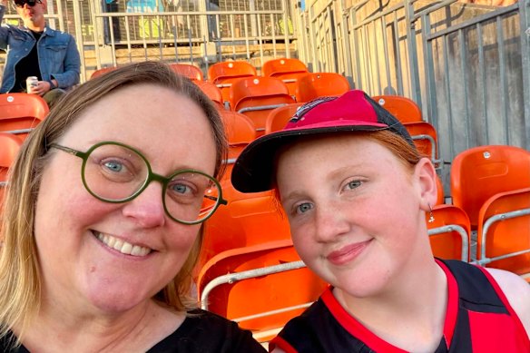 Emma Gray and her daughter Esther will be at the Swans AFLW match on Sunday. 