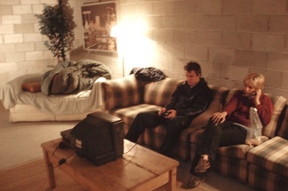 Artists Colin Bliss and Greta Scheing inside the apartment, circa 2005. 