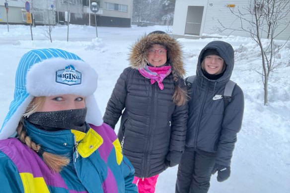  Marley Hines, right, standing with her host family “sister” Tanja, left, and host “mum” Marjo, centre, in Rovaniemi, Finland. 