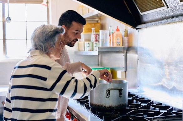 Fassy and Hinton cook together at Sultan’s Kitchen.