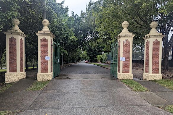 Temporary signage replaces the missing signs at the gates of Yeronga Memorial Park.