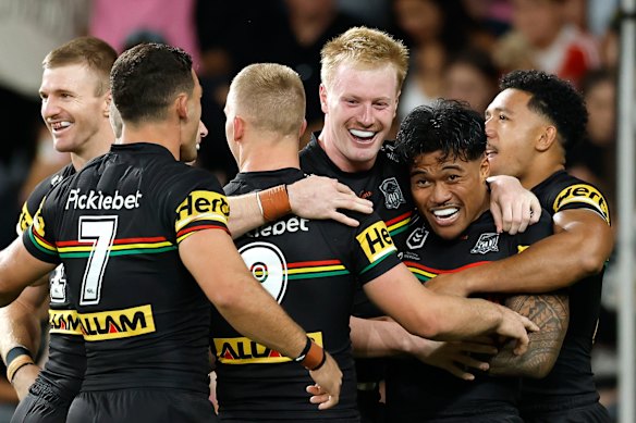 The Panthers celebrate a Brian To’o try. Statistics show the game isn’t any faster in 2026 following a significant rule change.