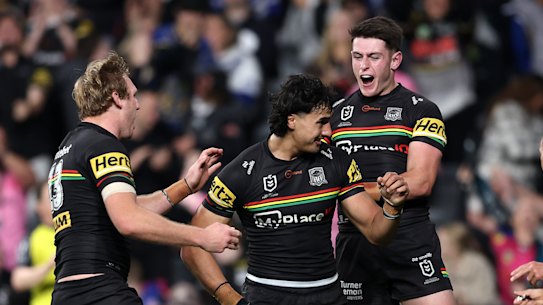 Casey McLean celebrates a try at CommBank Stadium.