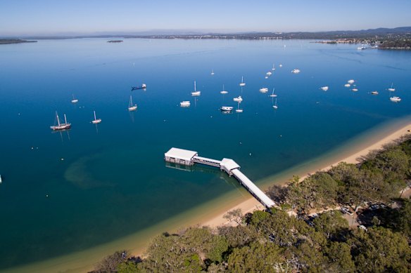 The jetty on Coochiemudlo Island, a small Moreton Bay island where a woman was arrested on Wednesday.