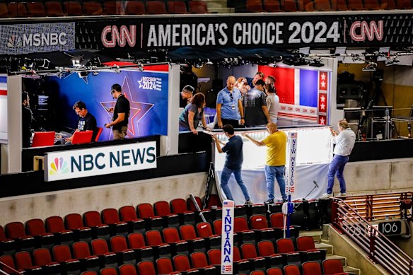 NBC News, MSNBC, and CNN signage at the United Centre ahead of the Democratic National Convention in Chicago in 2024.