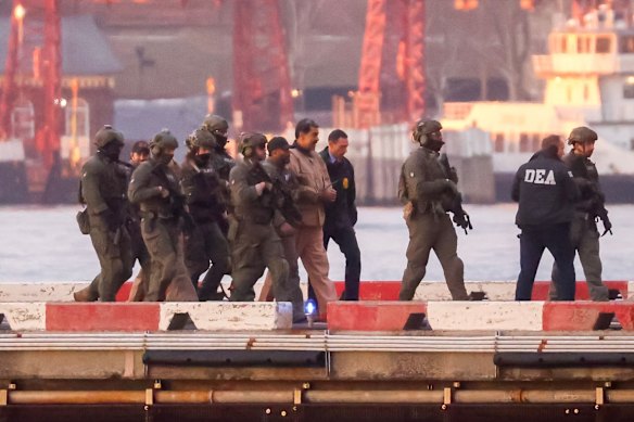 Nicolás Maduro is surrounded by security before his appearance in a New York court.