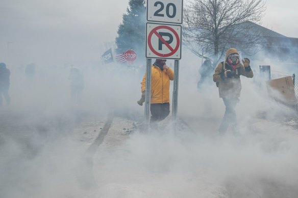 Teargas is deployed to disperse protesters in Minnesota.