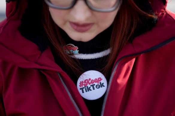 A content creator wears a “Keep TikTok” button outside the US Supreme Court in Washington.