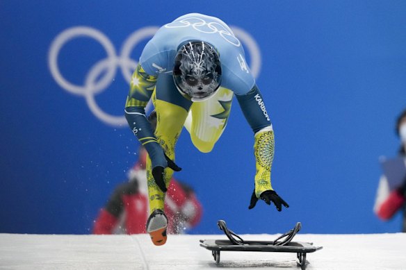 Nicholas Timmings, of Australia, slides during men’s skeleton run 1 at the 2022 Winter Olympics.