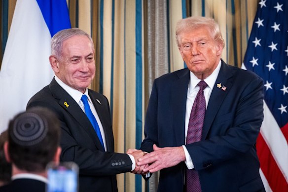 US President Donald Trump and Israeli Prime Minister Benjamin Netanyahu shake hands during the White House news conference.