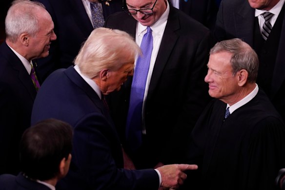 “Thank you again”: US President Donald Trump greets Chief Justice John Roberts after a speech to Congress in March 2025.