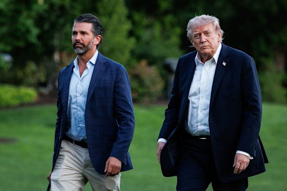 Trump and his son Don Jr returning to the White House from the Marine One helicopter earlier this month.