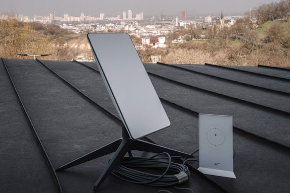 A Starlink satellite-internet communication system antenna and router on a rooftop in Kyiv, Ukraine.