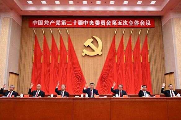 Members of the Politburo Standing Committee, from left, Li Xi, Cai Qi, Zhao Leji, Xi Jinping, Li Qiang, Wang Huning and Ding Xuexiang.