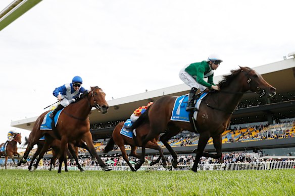 Tommy Berry wins the Golden Pendant on Manaal on September 27.
