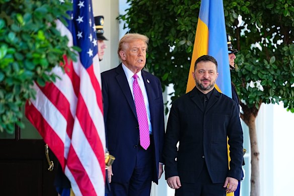 Donald Trump greets Volodymyr Zelensky at the White House.