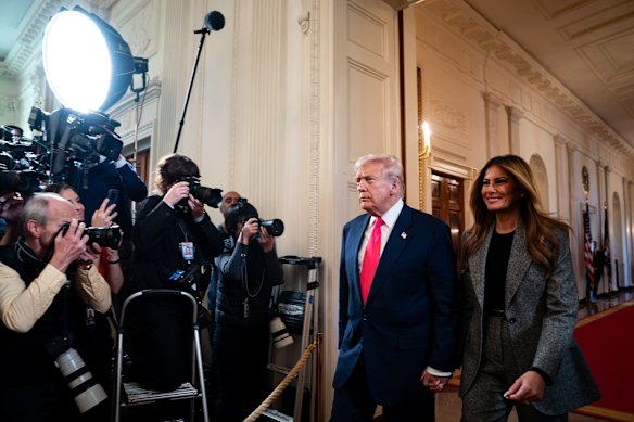 Donald Trump and first lady Melania Trump arrive at an executive order signing ceremony at the White House.