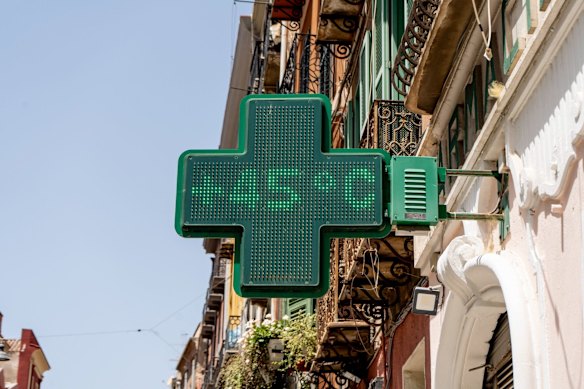 A digital display showing the temperature at 45 degrees at a pharmacy in Cagliari, Sardinia, in July.