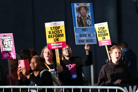 Protesters outside the Reform UK annual conference in Birmingham on Friday.