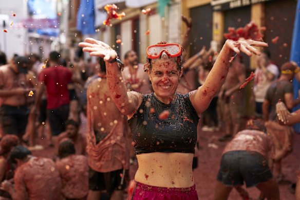 Revellers at Spain’s La Tomatina festival in Bunol, known as the world’s largest food fight.